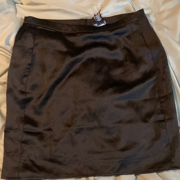 New Black Polyester Skirt (fits mid thigh for me) I was hoping for shorter! - Picture 1 of 2